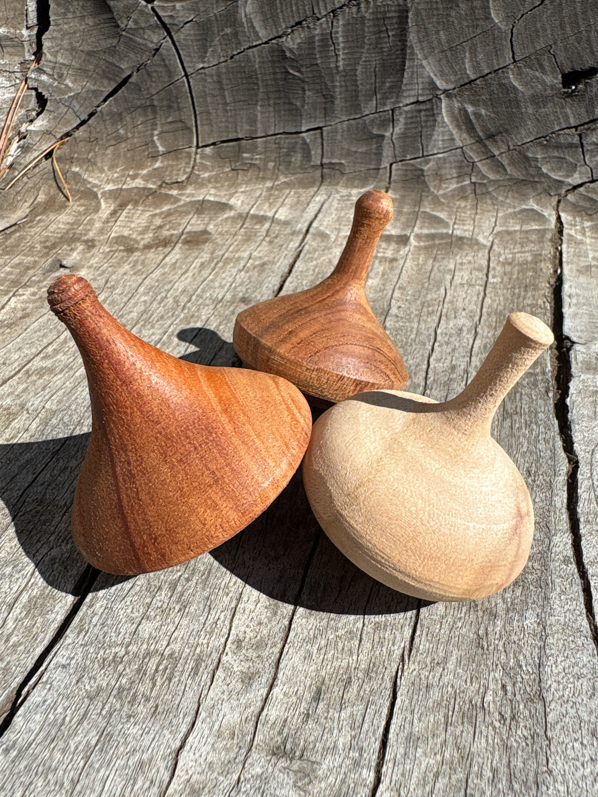 Spinning Tops Made from Local Wood