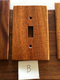 Finished koa light switches made by Michael Nizo