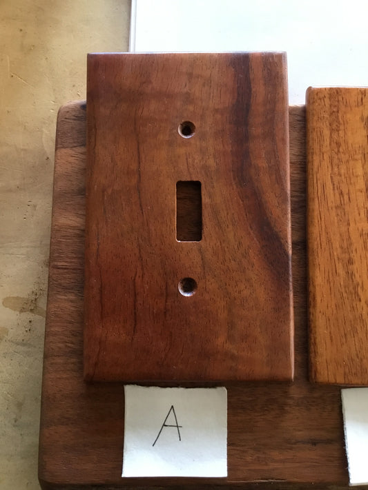 Finished koa light switches made by Michael Nizo
