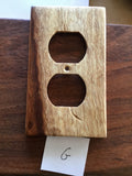 Finished koa light switches made by Michael Nizo