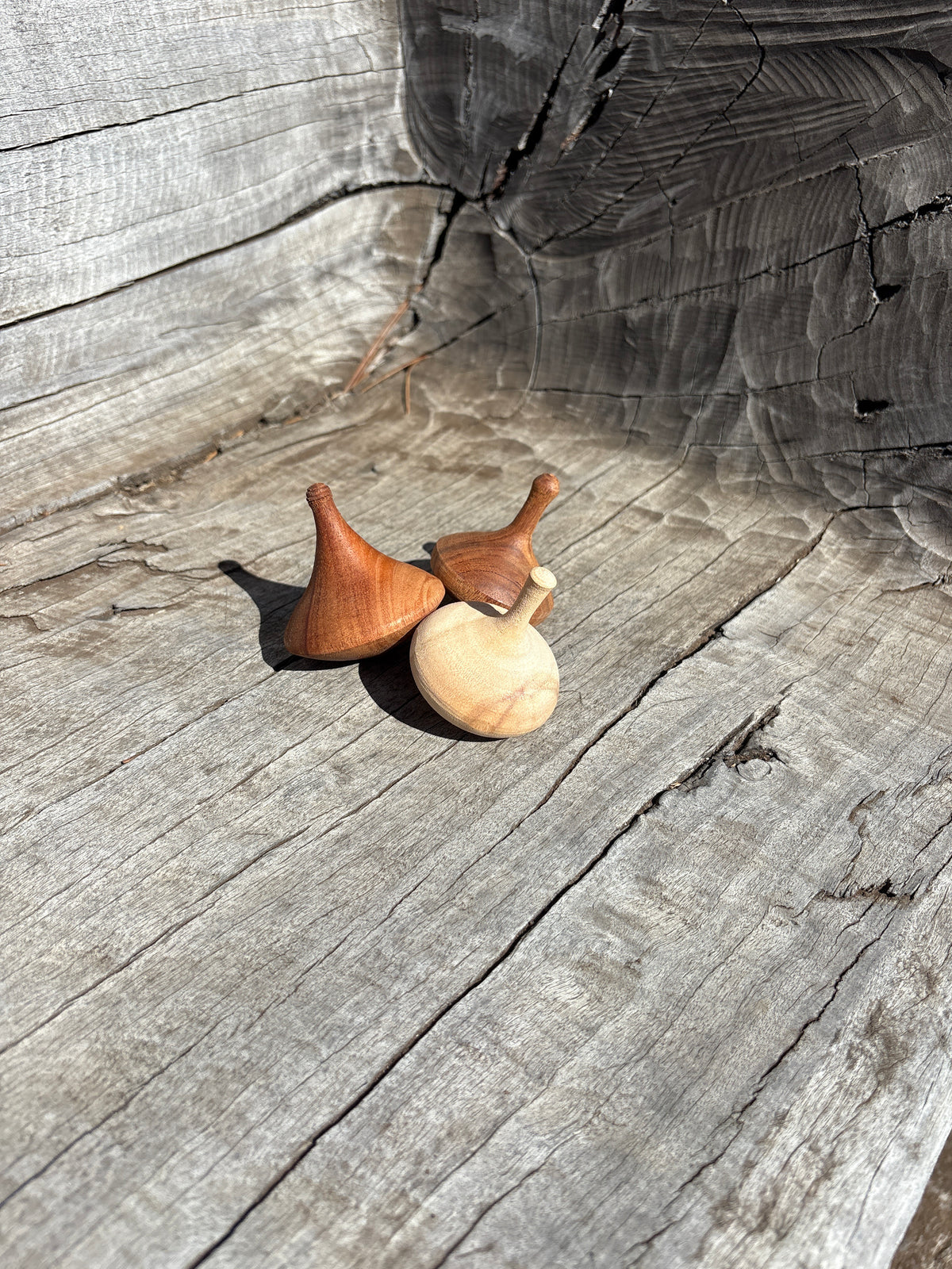 Spinning Tops Made from Local Wood